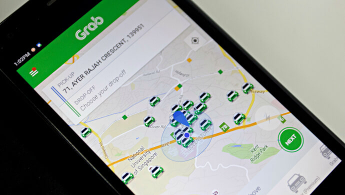 Uber bị cấm hoạt động, Grab bắt tay Here